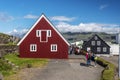 Red color side part of Langabud wooden building, the oldest in Djupivogur town in eastern Iceland, actually restaurant and the